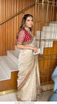 Bollywood Sabyasachi inspired beige and red silk based wedding saree